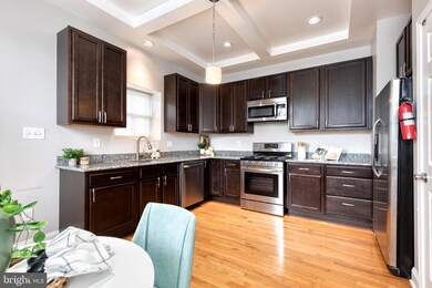 1711 E Chase St, Baltimore, MD 21213 - photo 4