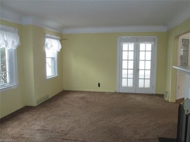 Living room looking towards the sun porch doors.