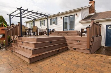 ENJOY THE 2-TIER COMPOSITE DECK, LOCATED OFF THE K
