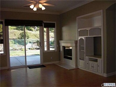 Family Room with open to kitchen with fireplace an