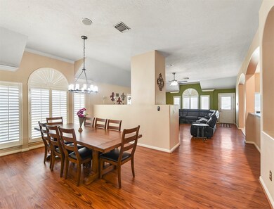 Formal dining area ~ light & bright with high ceilings throughout ~