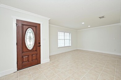 Foyer featuring recessed lighting, baseboards, vi