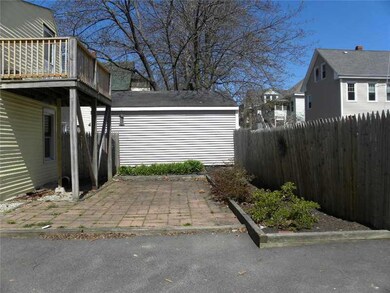 Exterior Back. WITH DECK & PATIO VIEW