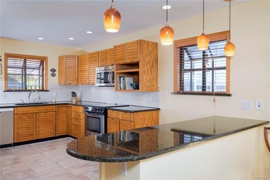 Another view of the spacious kitchen with herb gar
