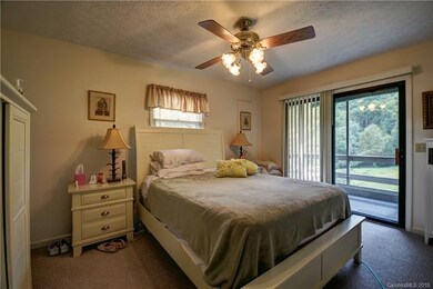 Master Bedroom with sliding glass door to a screen