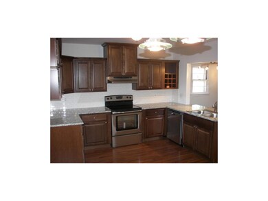 Wow! What a kitchen! New cabinets, appliances, gra