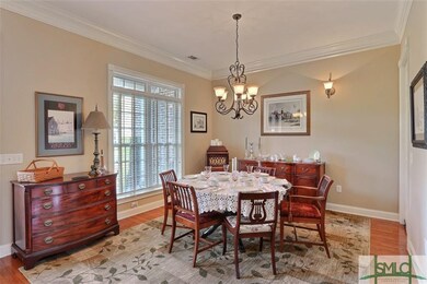Separate dining room with 8 foot servants swing do