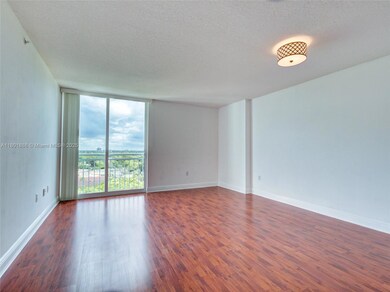 SPACIOUS LIVING AND DINING AREA WITH WOOD FLOORS
