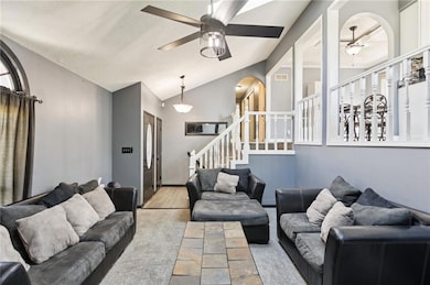 Another view of living room - open to the kitchen/dining area.