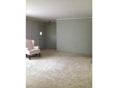 Living Room. The large room affords space for your