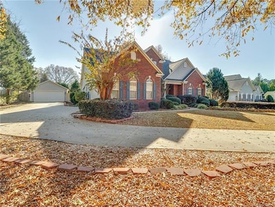 Long private driveway leading to 2 separate garage