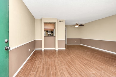 Unit welcomes you to clean neutral tones