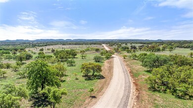 Birds eye view of property with a rural view and 