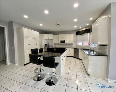 Kitchen with newer SS dishwasher