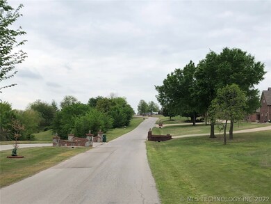The paved neighborhood contains beautiful homes! B