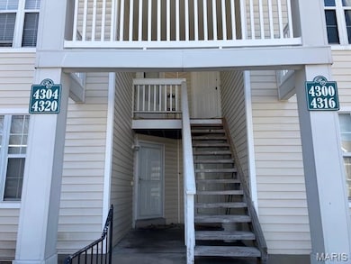 View of exterior stair entry to second floor Unit