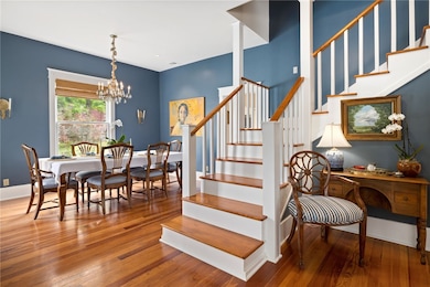 Dining room with pine floors.
