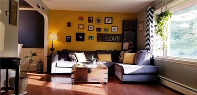 Living room - lovely flooring, and lots of natural