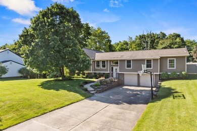 The 2-car garage has newer garage doors and opener