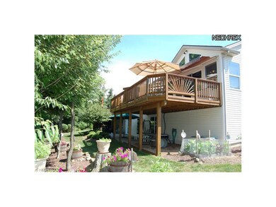 Upper deck spans rear of home . . .