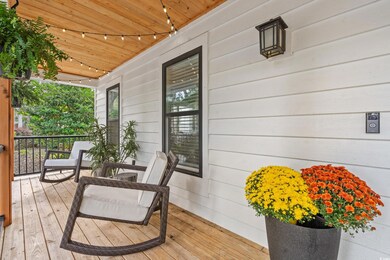 Deck featuring covered porch