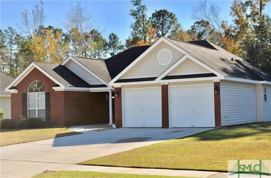 Large garage with double doors... this home is mov