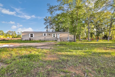 1027 County Road 3141 E, Cleveland, TX 77327 - photo 2