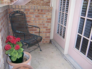 Small sitting area just outside the front door.