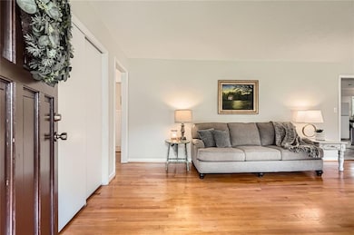 Bright and airy living room with gleaming hardwood