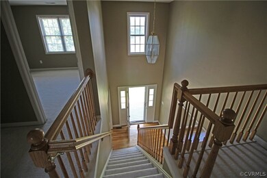 View from the second floor down to the foyer.