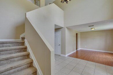 Formal dining off foyer