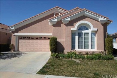 Front view of beautifully maintained home