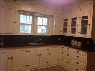 Original cabinets from floor to ceiling