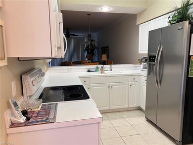 Kitchen with stainless steel fridge with icemaker 