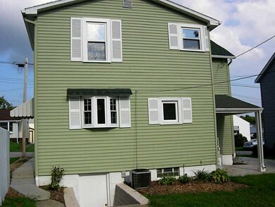 Exterior Back. New steps and door to basement.
