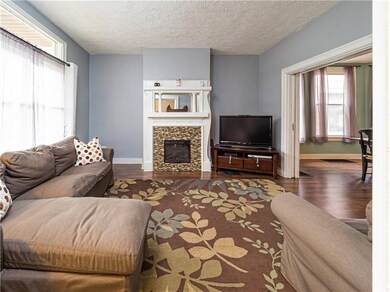 Bright windows, modern tones and pocket doors are 