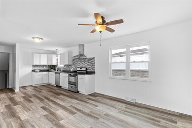 Dining Room with View of Kitchen
