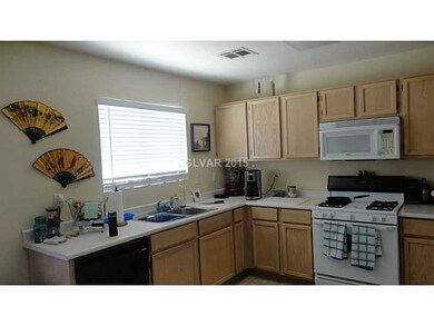 Kitchen. Gas stove, built-in microwave, and dishwa