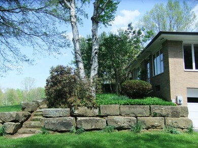 FDriveway view- what beautiful landscaping of barn