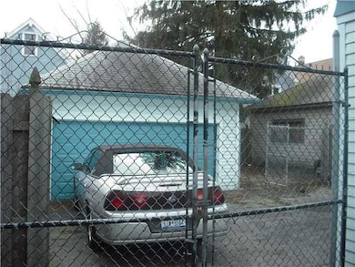 Yard/Garden. Garage in fenced yard.
