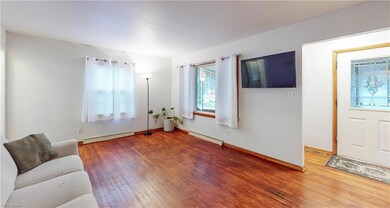 Sitting room featuring light hardwood flooring