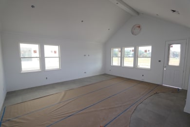 Great room and dining area - still under construct