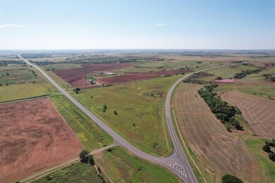 Aerial view of property and surrounding area featuring rural landscape