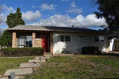 Front Entry with large olive tree.