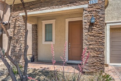 View of exterior entry featuring stucco siding