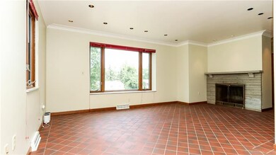 Living room showing corner fireplace, big picture 