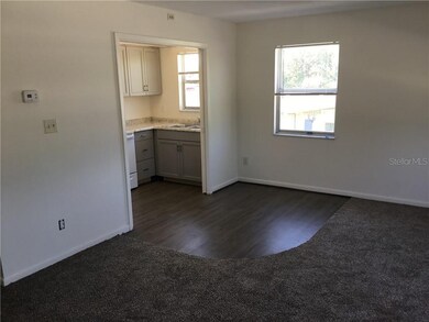 Living room looking into the kitchen from the front door