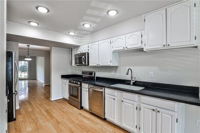 Clean kitchen with lots of countertop space.