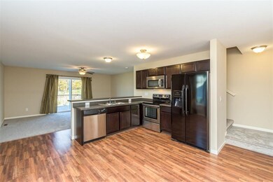 Inviting open floor plan with kitchen, living room