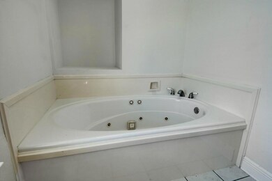 Over-sized jetted tub in master bath.  Also has a